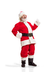 Hey, hello. Holly jolly x mas festive noel. Full length of funny happy santa in headwear, costume, black belt, white gloves, waves with arm palm standing at studio over white background