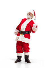 Hey, hello. Holly jolly x mas festive noel. Full length of funny happy santa in headwear, costume, black belt, white gloves, waves with arm palm standing at studio over white background