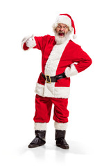Hey, hello. Holly jolly x mas festive noel. Full length of funny happy santa in headwear, costume, black belt, white gloves, waves with arm palm standing at studio over white background