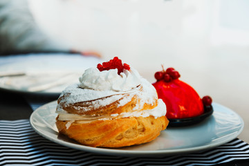 Profiterole with vanilla and chocolate sauce