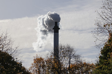 White smoke comes out of chimney 