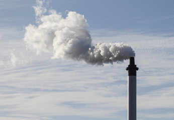 White smoke comes out of chimney 