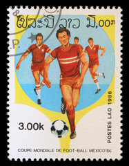 Stamp printed in LAOS shows the Soccer Players, with the inscription and name of series "World Cup Football Championship, Mexico - 1986", circa 1986