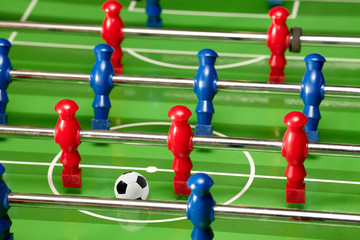Table football with red and blue players