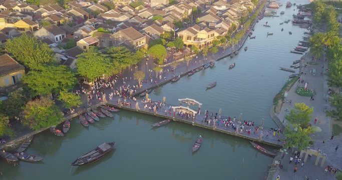 Aerial view panorama of Hoi An old town or Hoian ancient town. Royalty high-quality free stock video footage top view rooftop of street walking in Hoi An city. HoiAn city is UNESCO world heritage site