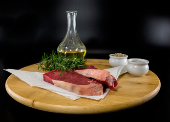 two steak entrecote on wooden plate