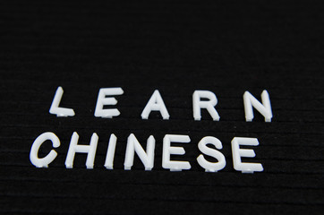 Learn languages sign on black background