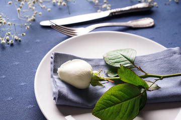 Beautiful table setting with floral decor, closeup