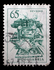 Stamp printed in Yugoslavia shows steel plant in Sevojno a local community in western Serbia, circa 1959