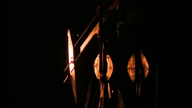 pumpjack at night