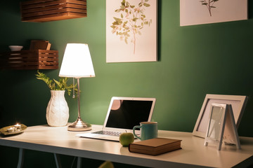 Stylish comfortable workplace in evening