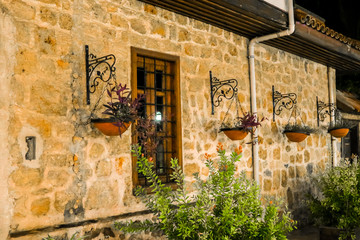Fototapeta na wymiar Wall with flower pots