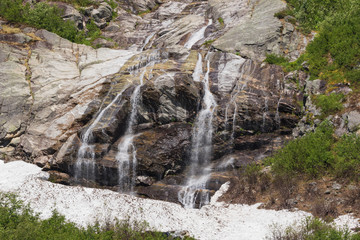 Melting water pouring down from the Jostedalsbreen into the valley of the Nigardsbreen