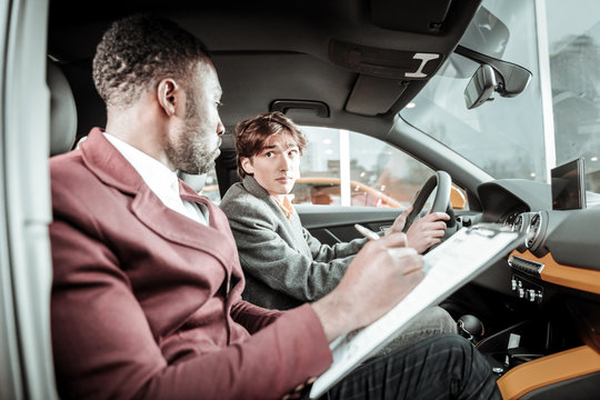 Young Man Feeling Excited Before Getting His Driving License