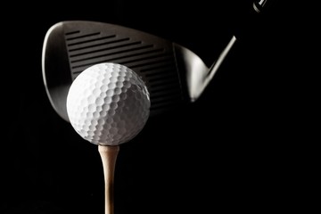 Closeup of Golf Club and Golf Ball on Tee, Isolated on White