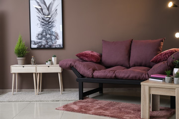 Interior of modern room with comfortable sofa