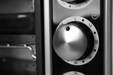 Regulator on modern electric oven, closeup