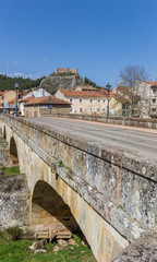 Bridge and castle in Aguilar de Campoo, Spain