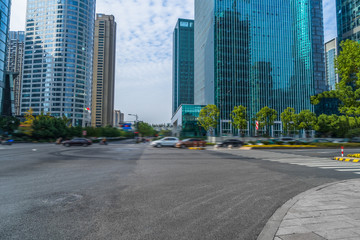 Empty asphalt road through modern city in Shanghai, China.