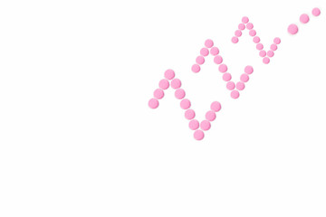 Pink pills in Z shape on the white background. Sleeping pills, hypnotic drugs, sedative. Insomnia. Psychology.