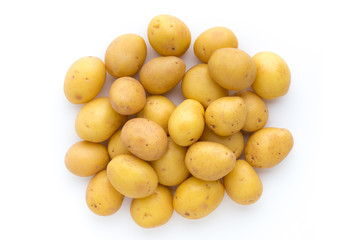 Young potato isolated on white background. Harvest new. Flat lay, top view