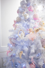 decorated blue Christmas tree, beautiful lights with gift