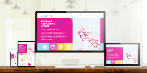 awesome responsive design website devices on wooden desktop