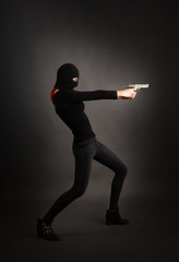 Girl in Black with Gun