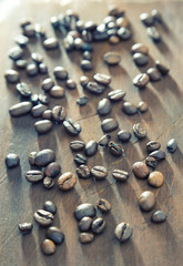Coffee beans on wooden background