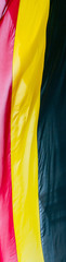 Close up of Belgium flag waving from Arcade du Cinquantenaire.