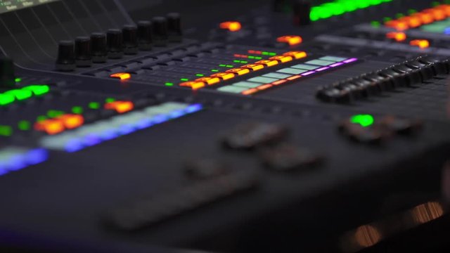 Mixing console close-up focus pull