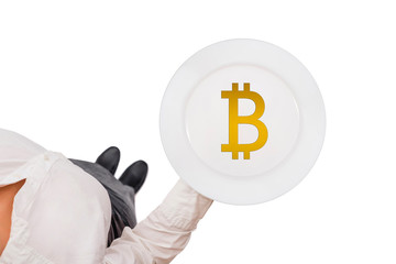 icon of virtual electronic money bitcoin served on empty plate. Top view of a waitress in a white blouse on the white background. Concept.