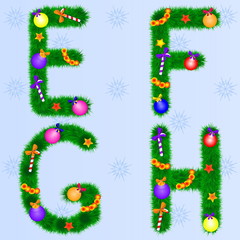 The alphabet from the branches of spruce with Christmas toys.Set of New Year fonts