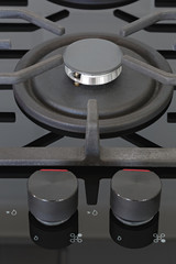 Control knobs burners on the gas kitchen stove.