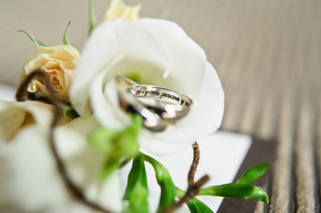 Wedding rings of the bride and groom, close up