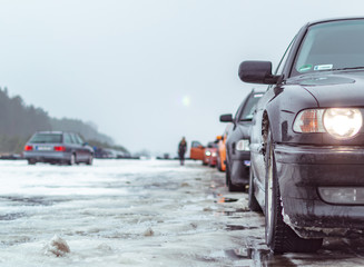 Obraz na płótnie Canvas Closeup of a car in winter