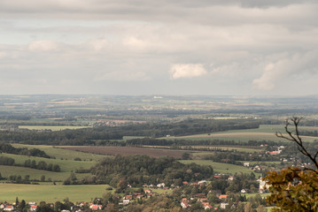 autumn countryside with mix of villages, meadows, fields and forest