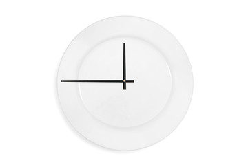 Top view of a empty serving plate as a clock with arrows on the white background. Concept. Isolated
