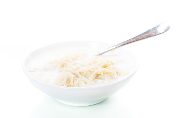 homemade sweet noodles with milk in a plate