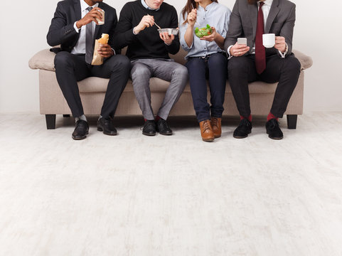 Business people having lunch in office
