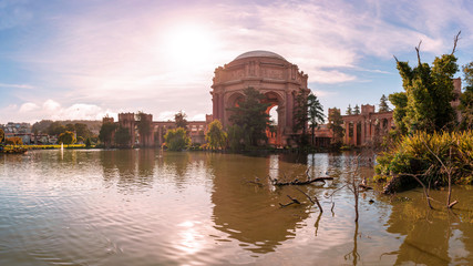 Palace of fine arts with a pond in front of it at sunny day. San Francisco, California.