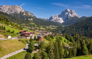Fototapeta na wymiar Typical summer village landscape in Dolomites, Italy