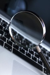 Magnifying Glass on a Laptop