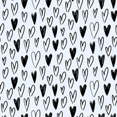 Vector seamless pattern with hand drawn hearts in sketch style.