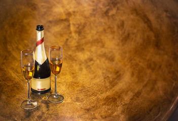 champagne glasses on gold background. Valentines day