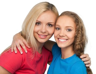 Portrait of Two Girlfriends / Sisters Hugging