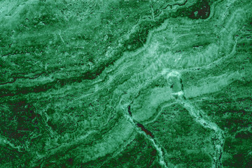 the texture of artificial marble green emerald color with a beautiful pattern similar to the mineral malachite.