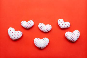 Valentine's hearts on red background
