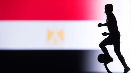Fototapeta na wymiar Egypt National Flag. Football, Soccer player Silhouette