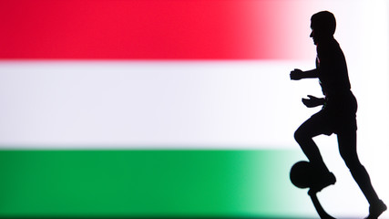 Fototapeta na wymiar Hungary National Flag. Football, Soccer player Silhouette